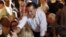  U.S. Republican presidential candidate Mitt Romney greets supporters after speaking at a pancake breakfast in Wauwatosa, Wisconsin, April 1, 2012. 