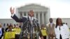 Ryan P. Haygood, director of the NAACP Legal Defense Fund, talks outside the Supreme Court in Washington, June 25, 2013, about the Shelby County v. Holder, a voting rights case in Alabama.