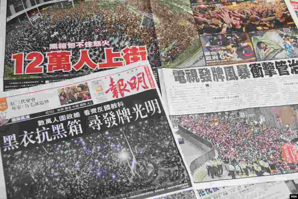 Kamchatka Brown Bear Mascha stands beside a Christmas tree, decorated with fruits and fish, at Hagenbecks zoo in Hamburg, northern Germany.