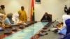 Des membres du MNLA et d'Ansar Dine à Ouagadougou le 16 novembre 2012, lors d'une rencontre avec le médiateur de la Cédéao pour le Mali, le président du Burkina Faso, Blaise Compaoré.
