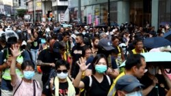 香港實施”禁蒙面法”首日 網民發起全民蒙面遊行抗爭