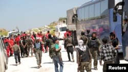 敘利亞反政府組織成員準備進入弗阿和克弗拉亞