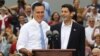 Republican U.S. Presidential candidate Mitt Romney (L) introduces Congressman Paul Ryan (R-WI) as his vice-presidential running mate during a campaign event at the retired battleship USS Wisconsin in Norfolk, Virginia, August 11, 2012.