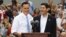 Republican U.S. Presidential candidate Mitt Romney (L) introduces Congressman Paul Ryan (R-WI) as his vice-presidential running mate during a campaign event at the retired battleship USS Wisconsin in Norfolk, Virginia, August 11, 2012.