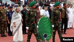 孟加拉国总理哈西娜出席了为死难的20名人质和两位警察举行的悼念仪式（2016年7月4日）