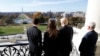 House Speaker Paul Ryan of Wis., left, shows President-elect Donald Trump, his wife Melania and Vice president-elect Mike Pence the view of the inaugural stand that is being built and Pennsylvania Avenue, from the Speaker's Balcony on Capitol Hill in Washington, Nov. 10, 2016.