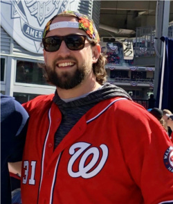 Zack Armstrong celebrating a win by the Washington National’s baseball team. Now the 29-year-old is quarantined with symptoms after a roommate tested positive for COVID and is in the hospital.