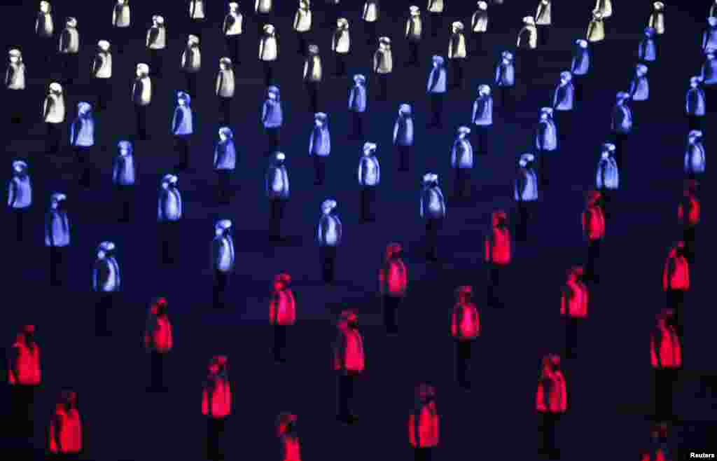 Members of the Korean Confederation of Trade Unions shout slogans while raising banners reading &quot;Let&#39;s end Park Geun-hye and Let&#39;s go on general strike&quot; during a rally against government policy in Seoul, South Korea. Thousands of protesters marched in cities across the country denouncing the labor policies of the increasingly unpopular president.