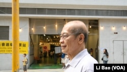 选民陈先生称民主自由至关重要