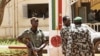 Malian junta soldiers stand guard at their headquarters in Kati, outside Mali's capital Bamako, April 1, 2012.