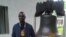 Stan Nyamanhindi at Liberty Bell, an iconic symbol of American Independence, in Philadelphia, Pennsylvania