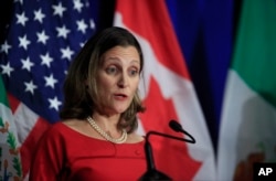 FILE - Canadian Minister of Foreign Affairs Chrystia Freeland, speaks during the conclusion of the fourth round of negotiations for a new North American Free Trade Agreement (NAFTA) in Washington, Oct. 17, 2017.