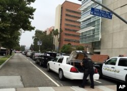Police work at the scene of a shooting at the University of California, Los Angeles, June 1, 2016.