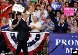 FILE - President Donald Trump arrives at a rally in Nashville, Tennessee, May 29, 2018.