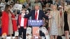 Republican presidential candidate Donald Trump, middle, speaks near his wife, Melania, left, son Baron, daughter Ivanka, second from right, and daughter Tiffany during a campaign event at the Myrtle Beach Convention Center on Nov. 24, 2015, in Myrtle Beac