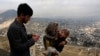FILE - A child receives polio vaccination drops during an anti-polio campaign in Kabul, Afghanistan.
