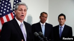 FILE - House Majority Whip Kevin McCarthy speaks as House Speaker John Boehner (C) and current Majority Leader Eric Cantor look on during a news conference on Capitol Hill in Washington.