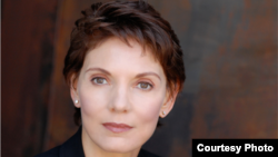 Julia Louis-Dreyfus, winner of the Best Actress in a Comedy Series, and Tony Hale, winner of the Best Supporting Actor in a Comedy Series, celebrate at the 65th Primetime Emmy Awards HBO after party in West Hollywood, Sept. 22, 2013. 