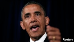 奥巴马6月7日为允许情报机构搜集美国电话记录信息而辩护。2013年6月7日