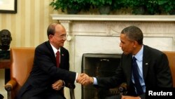 2013年5月20日美国总统奥巴马在白宫握手欢迎缅甸总统吴登盛的访问