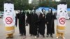Activists dressed as cigarettes and ghosts stage a campaign marking the World No Tobacco Day in Seoul, South Korea, May 31, 2012. 