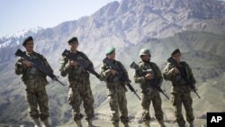 North Korean party officials visit Mankyongdae, the birthplace of North Korean founder Kim Il-sung, on the 101st anniversary of his birth, April 15, 2013. 