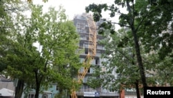 A crane lays against a construction site during the arrival of Hurricane Dorian in Halifax, Nova Scotia, Canada, Sept. 7, 2019. 