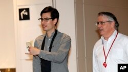 西格利7月4日从北京抵达东京。图片来源：美联社