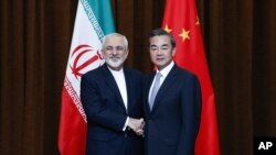 2015年9月15日，中國外長王毅與伊朗外長扎里夫在北京舉行雙邊會談。