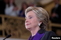 Hillary Clinton pauses as she addresses her staff and supporters about the results of the U.S. election at a hotel in the Manhattan borough of New York, Nov. 9, 2016.