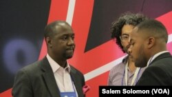 Conway Gittens, a reporter with Reuters Television, speaks to attendees at the National Association of Black Journalists and the National Association of Hispanic Journalists this week in Washington, Aug. 3, 2016. 