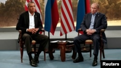 Барак Обама, Владимир Путин на встрече в кулуарах саммита G8 в Северной Ирландии. 17 июня 2013 г.