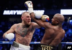 Mayweather(gama mirgaa)r fi McGregor(gama bitaa)