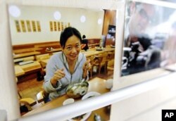 卡塔尔半岛电视台北京记者站英文新闻记者陈嘉韵