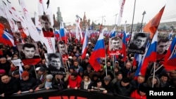 Россияне на одной из последних массовых акций. Демонстрация в память о Борисе Немцове, одном из главных противников Путина, застреленном в центре Москвы (Россия, 1 марта 2015 года).