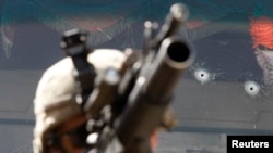 在阿富汗库纳尔省佩什山谷的美军。（2009年8月4日）