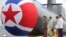 朝鲜官媒2023年9月8日发布照片显示，朝鲜领导人金正恩出席战略核攻击潜艇下水仪式。
