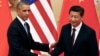 美国总统奥巴马和中国主席习近平在北京的记者会上握手(2014年11月12日)