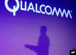 高通公司首席执行官莫伦科夫在拉斯维加斯的国际消费电子展上讲话。（2014年1月6日）高通受到中国针对外国企业的反垄断调查