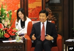 中国副主席李源潮在中南海会见西班牙外长（2013年6月25日）