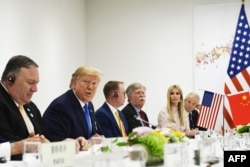 美国总统特朗普2019年6月29日在G20大阪峰会期间与中国主席习近平举行会谈。伊万卡·特朗普在场。