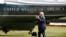 President Donald Trump walks on the South Lawn of the White House in Washington, Aug. 4, 2017, to board Marine One helicopter for a short trip to Andrews Air Force Base, Maryland, en route to Bedminster, N.J., for vacation.