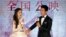 杨颖（Angelababy），井柏然（右）在北京的影片《微微一笑很倾城（Love O2O）》记者会上(2016年8月8日）