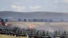 Китайские танки во время совместных учений с Россией «Восток-2018» на полигоне «Цугол», в 250 километрах к от Читы. В отличие от нынешних, в учениях 2018 года участвовало почти 300 тысяч российских военнослужащих и тысяча самолетов. Архивное фото AP