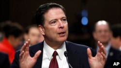 Джеймс Коми