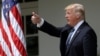 FILE - U.S. President Donald Trump gives a thumbs up during a National Day of Prayer event at the Rose Garden of the White House in Washington, May 4, 2017.