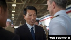 前台湾国防部副部长李喜明（ 美国海军作战部长格林纳特脸书官网图片）