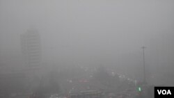 阴霾下的北京，白天宛如黑夜(资料照片)