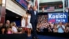 Republican U.S. presidential candidate and Ohio Governor John Kasich arrives on stage to formally announce his campaign for the 2016 Republican presidential nomination during a kickoff rally in Columbus, Ohio, July 21, 2015.