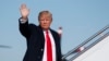President Donald Trump waves as he boards Air Force One, Jan. 18, 2018, at Andrews Air Force Base, Md. 